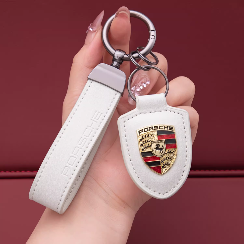 Load image into Gallery viewer, Porsche Crest Car Keychain Genuine Leather For Panamera, Cayenne, 911, Macan, Taycan
