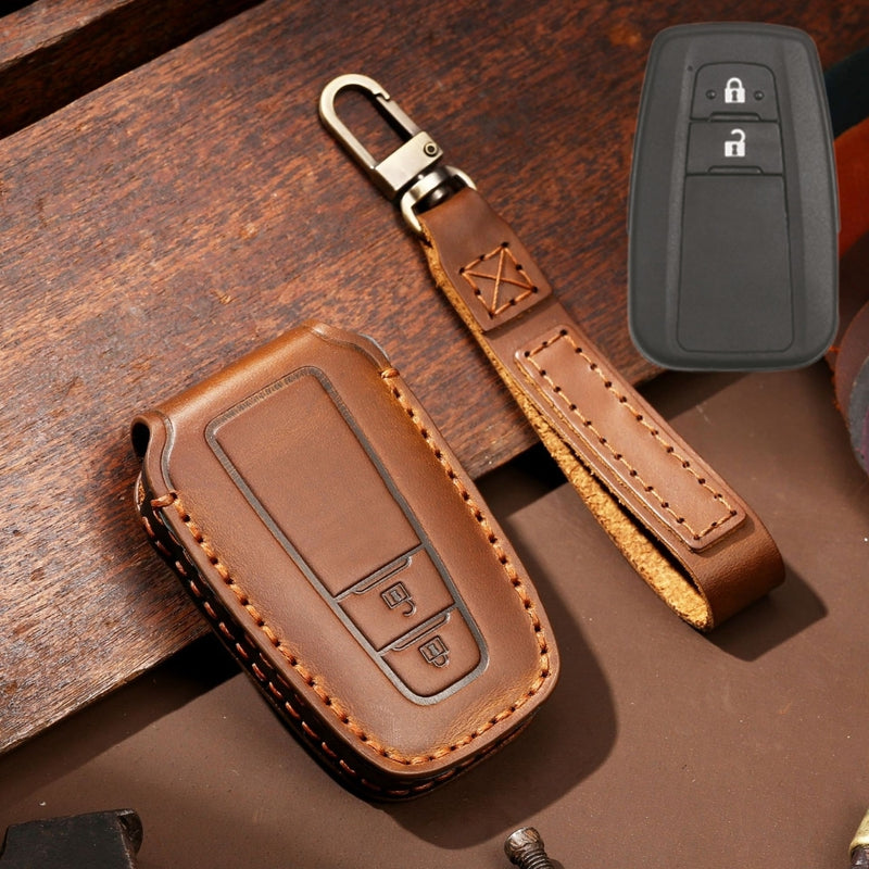 Load image into Gallery viewer, Toyota Handcrafted Genuine Leather Car Key Protective Case For Camry, C-HR, Corolla, RAV4, Avalon, Land Cruiser, Prado, Prius
