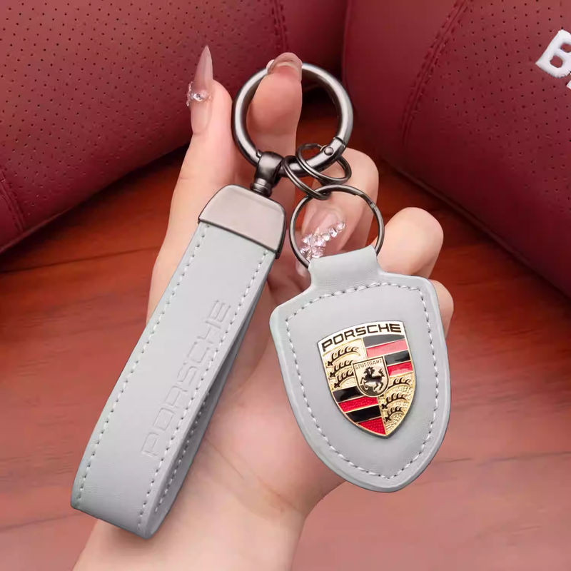Load image into Gallery viewer, Porsche Crest Car Keychain Genuine Leather For Panamera, Cayenne, 911, Macan, Taycan
