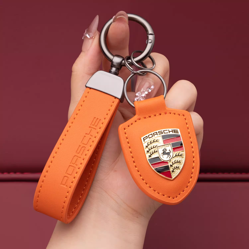 Load image into Gallery viewer, Porsche Crest Car Keychain Genuine Leather For Panamera, Cayenne, 911, Macan, Taycan
