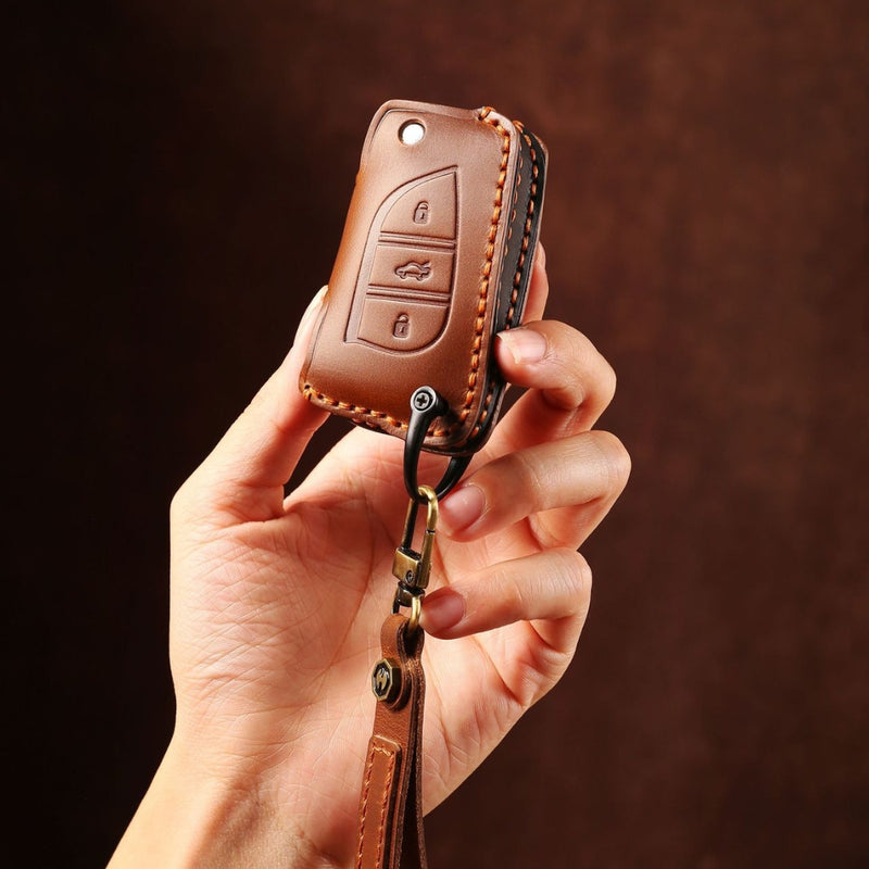 Load image into Gallery viewer, Toyota Handcrafted Genuine Leather Folding Key Protective Case For RAV4, Avalon, Avensis, Aygo, Camry, Corolla
