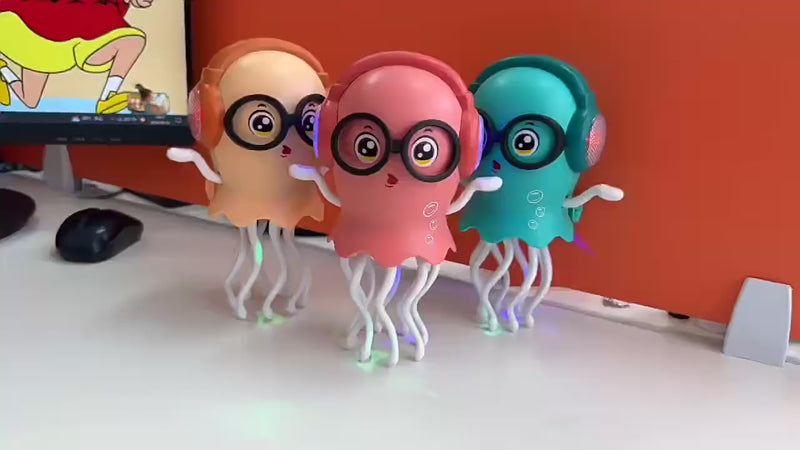 Load and play video in Gallery viewer, Electric Dancing Jellyfish Toy with Music &amp; Lights – Smart Obstacle Avoidance Crawling Toy for Toddlers &amp; Stress Relief Fun
